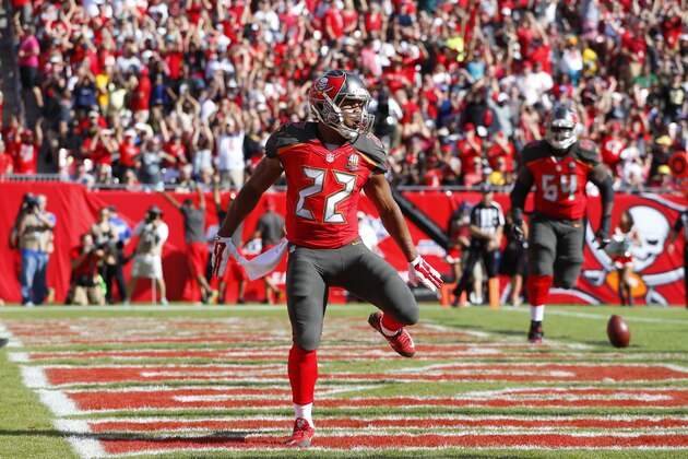 Tampa Bay Buccaneers running back Doug Martin (22) celebrates after a touchdown against the New Orleans Saints during an NFL football game Sunday, Dec. 13, 2015, in Tampa, Fla.  (Jeff Haynes/AP Images for Panini)