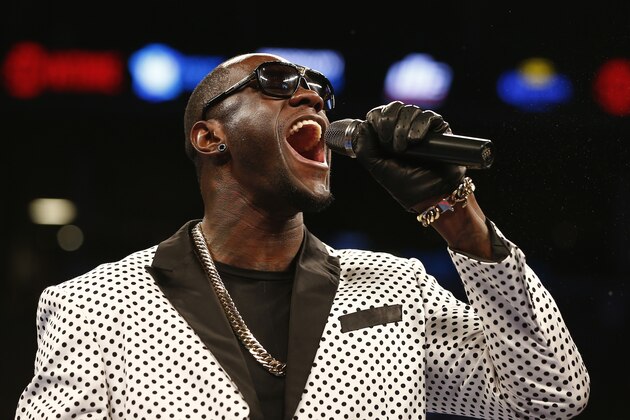 WBC heavy weight champ Deontay Wilder makes an appearance before the Jesus Cuellar, Jonathan Oquendo WBA featherweight championship boxing bout in New York on Saturday, Dec. 5, 2015. Cuellar won by a unanimous decision. (AP Photo/Rich Schultz) WBC heavy weight champ Deontay Wilder makes an appearance before the Jesus Cuellar, Jonathan Oquendo WBA featherweight championship boxing bout in New York on Saturday, Dec. 5, 2015. Cuellar won by a unanimous decision. (AP Photo/Rich Schultz)