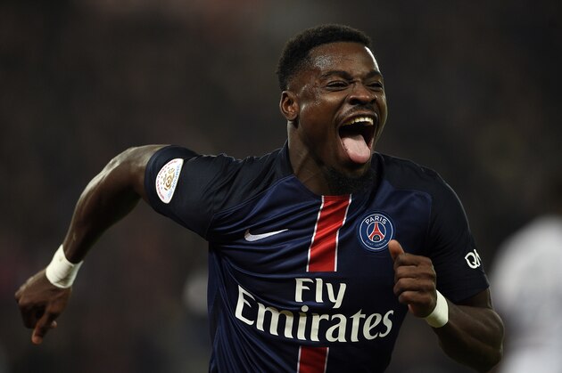 Paris Saint-Germain's French defender Serge Aurier celebrates after scoring a goal during the French Ligue 1 football match between Paris Saint-Germain (PSG) and Olympique Lyonnais at the Parc des Princes stadium in Paris on December 13, 2015. AFP PHOTO / FRANCK FIFE / AFP / FRANCK FIFE        (Photo credit should read FRANCK FIFE/AFP/Getty Images)