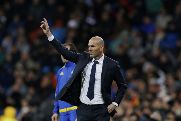 Real Madrid's new head coach Zinedine Zidane gives instructions from the side line during a Spanish La Liga soccer match between Real Madrid and Deportivo Coruna at the Santiago Bernabeu stadium in Madrid, Saturday, Jan. 9, 2016. (AP Photo/Francisco Seco)