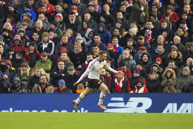 Manchester United's Wayne Rooney celebrates after scoring during the English Premier League soccer match between Liverpool and Manchester United at Anfield Stadium, Liverpool, England, Sunday, Jan. 17, 2016. (AP Photo/Jon Super)