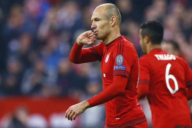 Bayern's Arjen Robben celebrates after scoring his side's fourth goal during the Champions League Group F soccer match between Bayern Munich and Arsenal FC in Munich, southern Germany, Wednesday, Nov. 4, 2015. (AP Photo/Matthias Schrader)