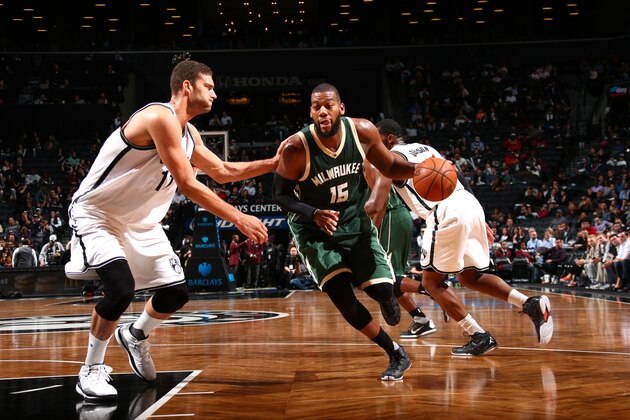 BROOKLYN, NY -  NOVEMBER 2: Greg Monroe #15 of the Milwaukee Bucks drives against Brook Lopez #11 of the Brooklyn Nets on November 2, 2015 at Barclays Center in Brooklyn, New York. NOTE TO USER: User expressly acknowledges and agrees that, by downloading and or using this Photograph, user is consenting to the terms and conditions of the Getty Images License Agreement. Mandatory Copyright Notice: Copyright 2015 NBAE (Photo by Ned Dishman/NBAE via Getty Images)