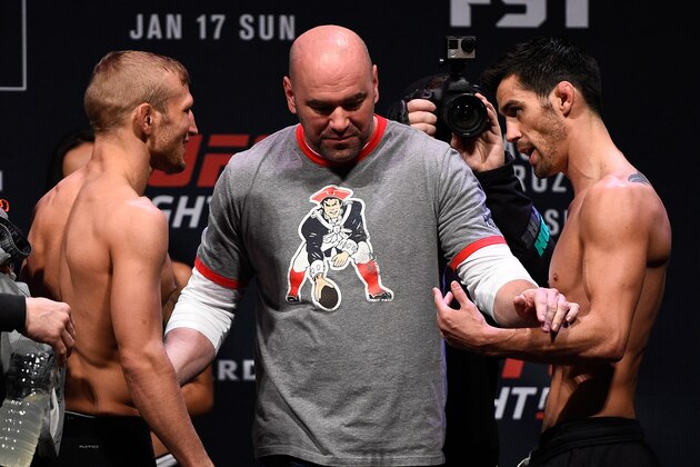 BOSTON, MA - JANUARY 16:  (L-R) Opponents TJ Dillashaw and Dominick Cruz face off during the UFC weigh-in at the Wang Theatre on January 16, 2016 in Boston, Massachusetts. (Photo by Jeff Bottari/Zuffa LLC/Zuffa LLC via Getty Images)