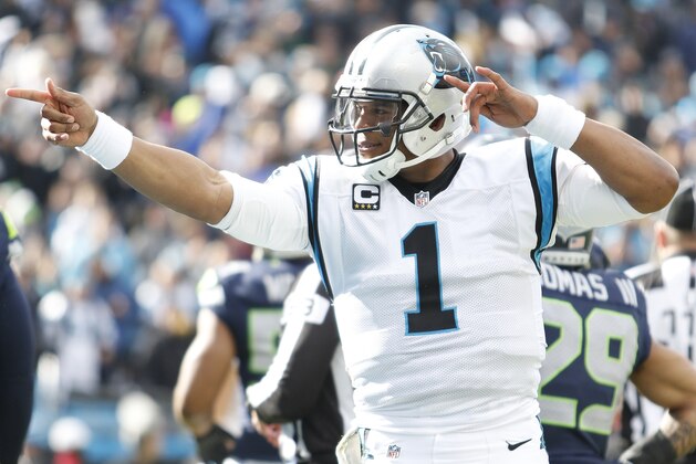 Carolina Panthers quarterback Cam Newton (1) signifies a first down against the Seattle Seahawks during the first half of an NFL divisional playoff football game, Sunday, Jan. 17, 2016, in Charlotte, N.C. (AP Photo/Bob Leverone)