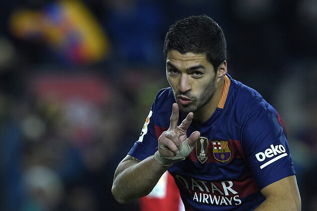 Barcelona's Uruguayan forward Luis Suarez celebrates after scoring during the Spanish league football match FC Barcelona vs Athletic Club Bilbao at the Camp Nou stadium in Barcelona on January 17, 2016.   AFP PHOTO/ LLUIS GENE / AFP / LLUIS GENE        (Photo credit should read LLUIS GENE/AFP/Getty Images)