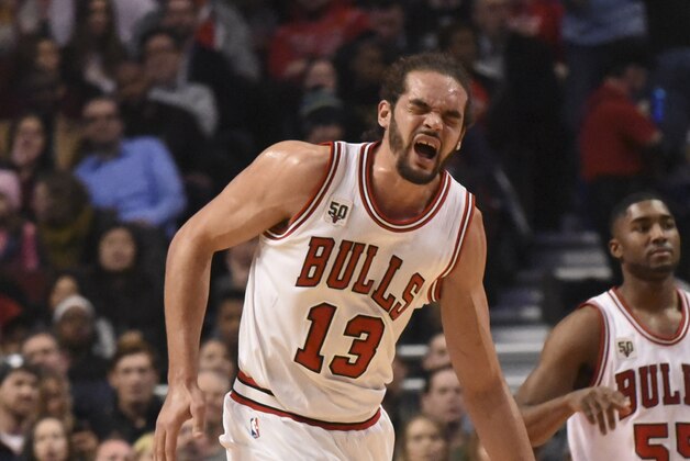 Jan 15, 2016; Chicago, IL, USA; Chicago Bulls center Joakim Noah (13) reacts after dislocating his shoulder against the Dallas Mavericks during the first half at the United Center. Mandatory Credit: David Banks-USA TODAY Sports