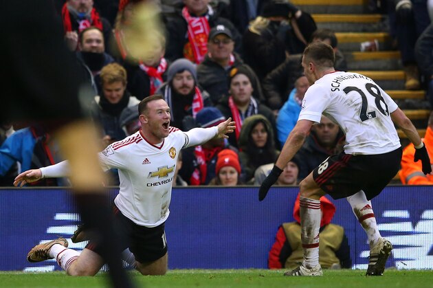 LIVERPOOL, ENGLAND - JANUARY 17:  Wayne Rooney of Manchester United celebrates with Morgan Schneiderlin after scoring the winning goal during the Barclays Premier League match between Liverpool and Manchester United at Anfield on January 17, 2016 in Liverpool, England.  (Photo by Alex Livesey/Getty Images)
