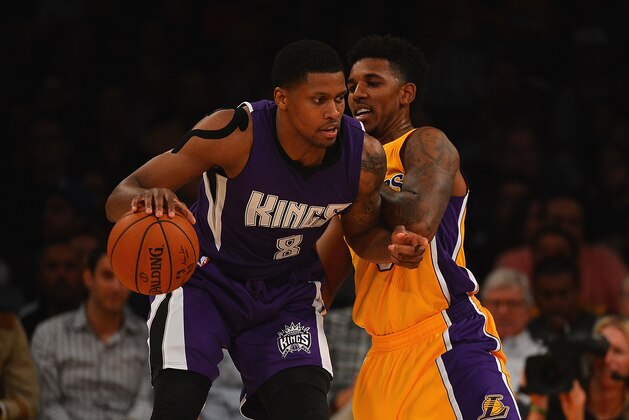 LOS ANGELES, CA - DECEMBER 09:  Rudy Gay #8 of the Sacramento Kings drives the ball past Nick Young #0 of the Los Angeles Lakers during a game at Staples Center on December 9, 2014 in Los Angeles, California.   NOTE TO USER: User expressly acknowledges and agrees that, by downloading and or using this photograph, User is consenting to the terms and conditions of the Getty Images License Agreement.  (Photo by Jonathan Moore/Getty Images)