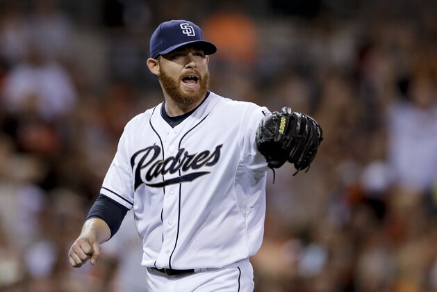 San Diego Padres starting pitcher Ian Kennedy yells towards a teammate while playing the San Francisco Giants of a baseball game Thursday, Sept. 24, 2015, in San Diego. (AP Photo/Gregory Bull)