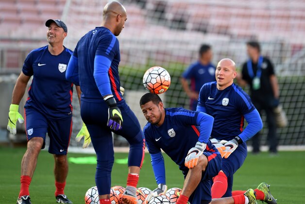 US Men's soccer team goalkeepers Tim Howard (2L) and Brad Guzan (R) work with coaching staff during a training session at the Rose Bowl in Pasadena, California on October 9, 2015.  Mexico plays the United States here in the playoff match for the FIFA Confederations Cup.      AFP PHOTO / MARK RALSTON        (Photo credit should read MARK RALSTON/AFP/Getty Images)