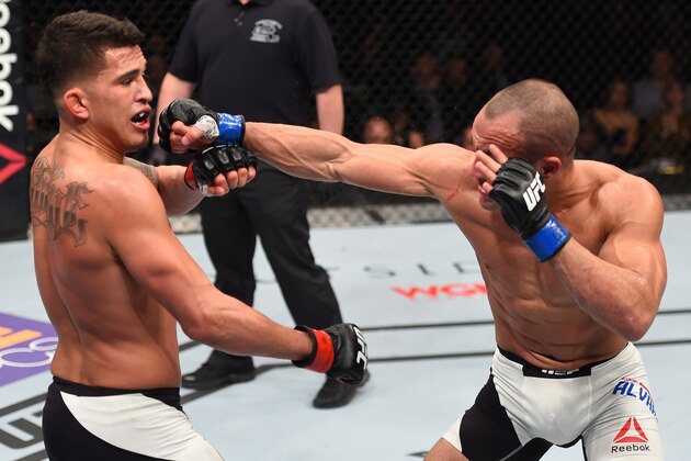 BOSTON, MA - JANUARY 17:  (R-L) Eddie Alvarez punches Anthony Pettis in their lightweight bout during the UFC Fight Night event inside TD Garden on January 17, 2016 in Boston, Massachusetts. (Photo by Jeff Bottari/Zuffa LLC/Zuffa LLC via Getty Images)