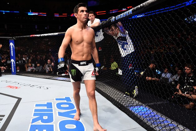 BOSTON, MA - JANUARY 17:  Dominick Cruz stands in the Octagon before his UFC bantamweight championship bout against TJ Dillashaw during the UFC Fight Night event inside TD Garden on January 17, 2016 in Boston, Massachusetts. (Photo by Jeff Bottari/Zuffa LLC/Zuffa LLC via Getty Images)