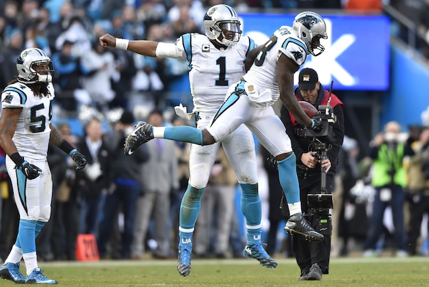 Jan 17, 2016; Charlotte, NC, USA; Carolina Panthers outside linebacker Thomas Davis (58) and Cam Newton (1) celebrate Davis's onside kick recovery in the fourth quarter during the NFC Divisional round playoff game at Bank of America Stadium. The Panthers defeated the Seahawks 31-24. Mandatory Credit: Bob Donnan-USA TODAY Sports