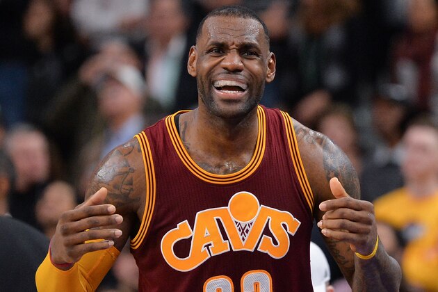 Cleveland Cavaliers forward LeBron James gestures to the Cleveland bench during the second half of an NBA basketball game against the San Antonio Spurs, Thursday, Jan. 14, 2016, in San Antonio. San Antonio won 99-95. (AP Photo/Darren Abate)