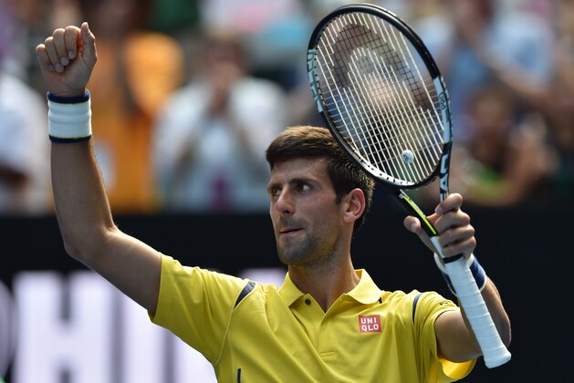 Serbia's Novak Djokovic celebrates after victory in his men's singles match against South Korea's Chung Hyeon on day one of the 2016 Australian Open tennis tournament in Melbourne on January 18, 2016. AFP PHOTO / SAEED KHAN-- IMAGE RESTRICTED TO EDITORIAL USE - STRICTLY NO COMMERCIAL USE / AFP / SAEED KHAN        (Photo credit should read SAEED KHAN/AFP/Getty Images)