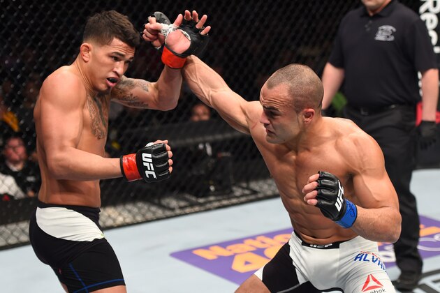 BOSTON, MA - JANUARY 17:  (R-L) Eddie Alvarez punches Anthony Pettis in their lightweight bout during the UFC Fight Night event inside TD Garden on January 17, 2016 in Boston, Massachusetts. (Photo by Jeff Bottari/Zuffa LLC/Zuffa LLC via Getty Images)