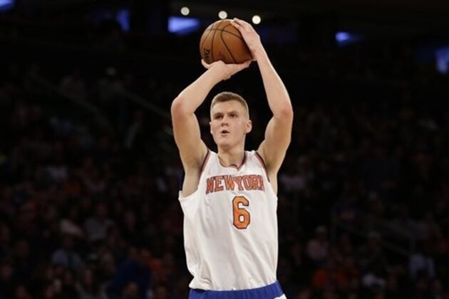 New York Knicks' Kristaps Porzingis looks to take a shot during the second half of the NBA basketball game against the Houston Rockets, Sunday, Nov. 29, 2015 in New York. The Rockets defeated the Knicks in overtime 116-111. (AP Photo/Seth Wenig)