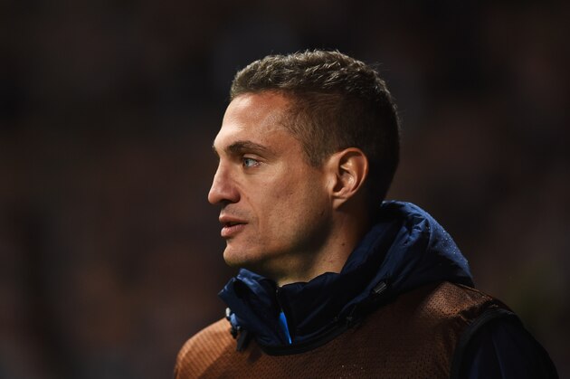 GLASGOW, SCOTLAND - FEBRUARY 19:  Substitute Nemanja Vidic of Inter Milan looks on during the UEFA Europa League Round of 32 first leg match between Celtic FC and FC Internazionale Milano at Celtic Park Stadium on February 19, 2015 in Glasgow, United Kingdom.  (Photo by Laurence Griffiths/Getty Images)
