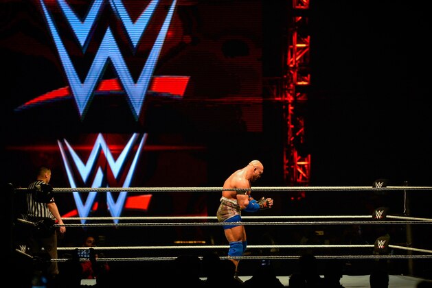 In this photograph taken on January 15, 2016, wrestler Ryback (R) gives thanks to spectators during the World Wrestling Entertainment (WWE) Live India Tour in New Delhi.    Enthusiastic fans flocked to the event as WWE returned to the country after an interval of 13 years.   AFP PHOTO/ CHANDAN KHANNA / AFP / Chandan Khanna        (Photo credit should read CHANDAN KHANNA/AFP/Getty Images)