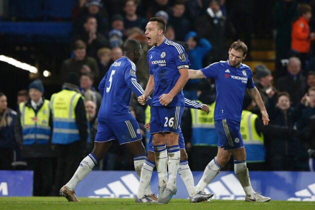 Chelsea's English defender John Terry (C) celebrates scoring a late equalising goal to make the score 3-3 during the English Premier League football match between Chelsea and Everton at Stamford Bridge in London on January 16, 2016. AFP PHOTO / ADRIAN DENNIS

RESTRICTED TO EDITORIAL USE. No use with unauthorized audio, video, data, fixture lists, club/league logos or 'live' services. Online in-match use limited to 75 images, no video emulation. No use in betting, games or single club/league/player publications. / AFP / ADRIAN DENNIS        (Photo credit should read ADRIAN DENNIS/AFP/Getty Images)