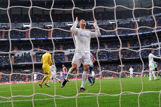 MADRID, SPAIN - JANUARY 17:  Cristiano Ronaldo of Real Madrid reacts after failing to score a goal during the La Liga match between Real Madrid CF and Sporting Gijon at Estadio Santiago Bernabeu on January 17, 2016 in Madrid, Spain.  (Photo by Denis Doyle/Getty Images)