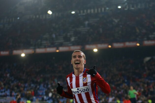 Atletico Madrid's Antoine Griezmann celebrates after scoring his team's third goal against Rayo Vallecano during the Copa del Rey second leg soccer match between Atletico Madrid and Rayo Vallecano at the Vicente Calderon stadium, in Madrid, Thursday, Jan. 14, 2016. Atletico Madrid won 4-1 on aggregate and moved to the next round. (AP Photo/Francisco Seco)