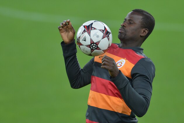 Galatasaray defender Emmanuel Eboue attends a training session on the eve of the Champion's League football match Juventus vs Galatasaray on October 1, 2013 in Turin. Mancini, sacked by Manchester City at the end of last season following a shock defeat to Wigan in the final of the FA Cup, signed a three-year contract to manage the struggling Turkish champions.  AFP PHOTO / GIUSEPPE CACACE        (Photo credit should read GIUSEPPE CACACE/AFP/Getty Images)