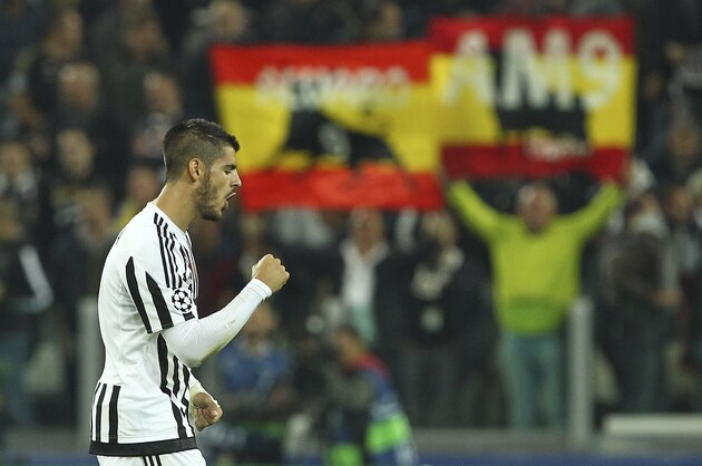 TURIN, ITALY - SEPTEMBER 30:  Alvaro Morata #9 of Juventus FC celebrates after scoring the opening goal during the UEFA Champions League group E match between Juventus and Sevilla FC at Juventus Arena on September 30, 2015 in Turin, Italy.  (Photo by Marco Luzzani/Getty Images)
