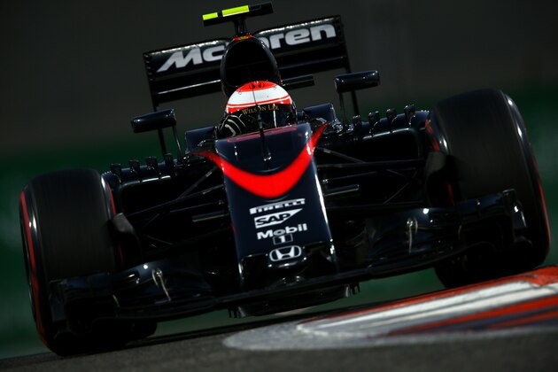 ABU DHABI, UNITED ARAB EMIRATES - NOVEMBER 28:  Jenson Button of Great Britain and McLaren Honda drives during qualifying for the Abu Dhabi Formula One Grand Prix at Yas Marina Circuit on November 28, 2015 in Abu Dhabi, United Arab Emirates.  (Photo by Paul Gilham/Getty Images)