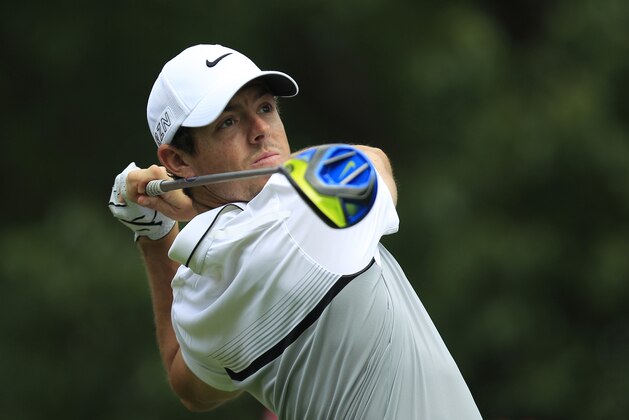 Rory McIlroy of Northern Ireland tees off on the 14th hole during the first round of the HSBC Champions golf tournament at the Sheshan International Golf Club in Shanghai, China Thursday, Nov. 5, 2015. (AP Photo)