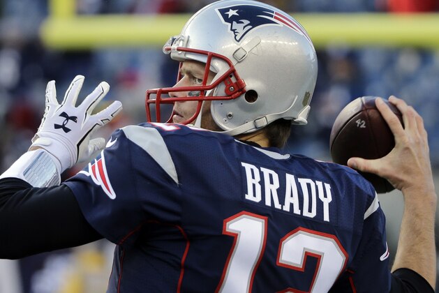 New England Patriots quarterback Tom Brady warms up before an NFL divisional playoff football game against the Kansas City Chiefs, Saturday, Jan. 16, 2016, in Foxborough, Mass. (AP Photo/Elise Amendola)