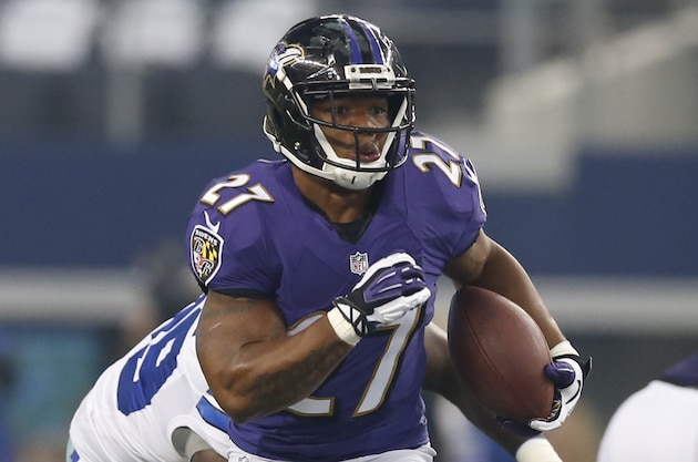 Aug 16, 2014; Arlington, TX, USA; Baltimore Ravens running back Ray Rice (27) runs with the ball during the game against the Dallas Cowboys at AT&T Stadium. Mandatory Credit: Matthew Emmons-USA TODAY Sports