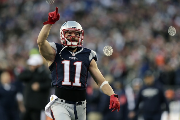 New England Patriots wide receiver Julian Edelman takes the field for an NFL divisional playoff football game against the Kansas City Chiefs, Saturday, Jan. 16, 2016, in Foxborough, Mass. (AP Photo/Charles Krupa)