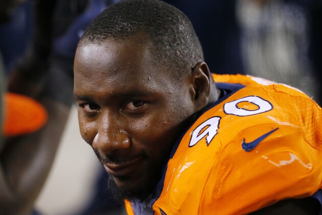 Denver Broncos defensive end Antonio Smith looks on during an NFL football game between the Denver Broncos and the Kansas City Chiefs, Sunday, Nov. 15, 2015, in Denver. (AP Photo/Jack Dempsey)