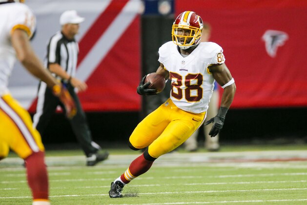 Washington Redskins wide receiver Pierre Garcon (88) runs with the ball against the Atlanta Falcons during an NFL game at the Georgia Dome in Atlanta on Sunday, Oct. 11, 2015. (Chris Keane/AP Images for Panini)