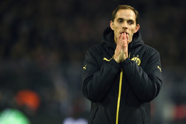 Dortmund's head coach Thomas Tuchel reacts during the German first division Bundesliga football match Borussia Dortmund vs Eintracht Frankfurt in Dortmund, western Germany, on December 13, 2015. AFP PHOTO / PATRIK STOLLARZ

RESTRICTIONS: DURING MATCH TIME: DFL RULES TO LIMIT THE ONLINE USAGE TO 15 PICTURES PER MATCH AND FORBID IMAGE SEQUENCES TO SIMULATE VIDEO. == RESTRICTED TO EDITORIAL USE == FOR FURTHER QUERIES PLEASE CONTACT DFL DIRECTLY AT + 49 69 650050. / AFP / PATRIK STOLLARZ        (Photo credit should read PATRIK STOLLARZ/AFP/Getty Images)