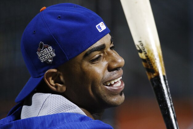 New York Mets' Yoenis Cespedes waits to hit during batting practice before Game 5 of the Major League Baseball World Series between the New York Mets and Kansas City Royals Sunday, Nov. 1, 2015, in New York. (AP Photo/Matt Slocum)