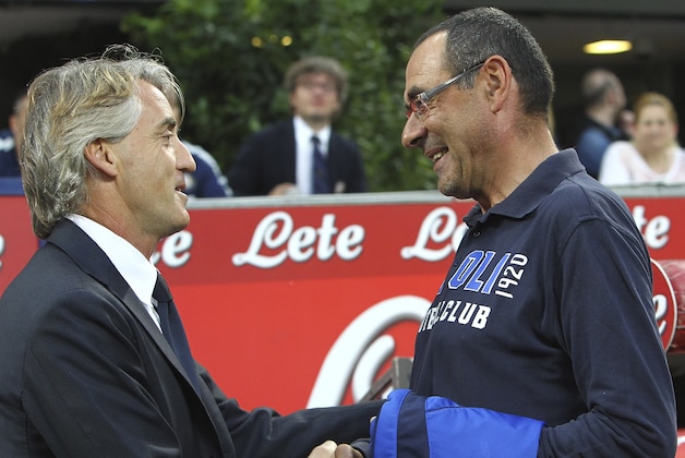 MILAN, ITALY - MAY 31:  FC Internazionale Milano coach Roberto Mancini (L) shakes hands with Empoli FC coach Maurizio Sarri (R) before the Serie A match between FC Internazionale Milano and Empoli FC at Stadio Giuseppe Meazza on May 31, 2015 in Milan, Italy.  (Photo by Marco Luzzani/Getty Images)
