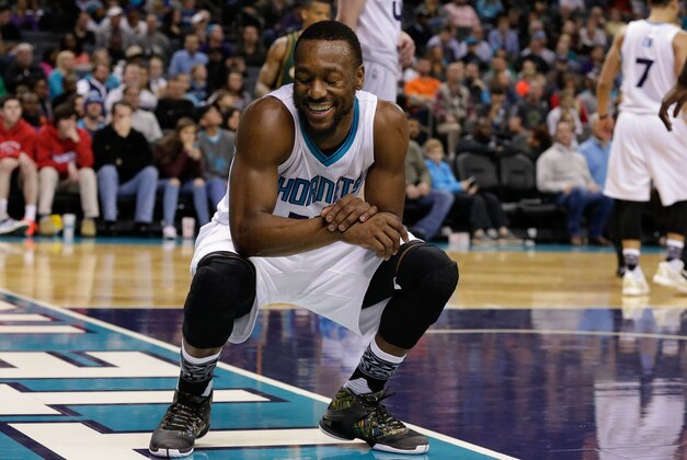 Jan 18, 2016; Charlotte, NC, USA; Charlotte Hornets guard Kemba Walker (15) reacts after getting called for a foul in the second half against the Utah Jazz at Time Warner Cable Arena. The Hornets defeated the Jazz in two overtimes 124-119. Mandatory Credit: Jeremy Brevard-USA TODAY Sports