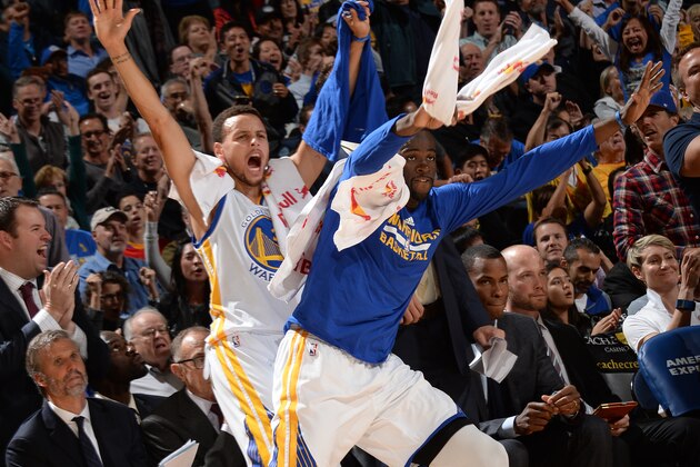 OAKLAND, CA - NOVEMBER 2:  Stephen Curry #30 of the Golden State Warriors and Draymond Green #23 of the Golden State Warriors celebrate during the game against the Memphis Grizzlies during the game on November 2, 2015 at ORACLE Arena in Oakland, California. NOTE TO USER: User expressly acknowledges and agrees that, by downloading and or using this photograph, user is consenting to the terms and conditions of Getty Images License Agreement. Mandatory Copyright Notice: Copyright 2015 NBAE (Photo by Noah Graham/NBAE via Getty Images)