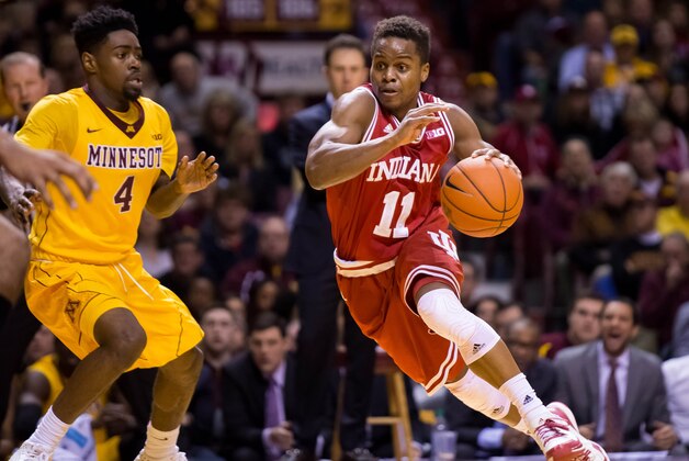Jan 16, 2016; Minneapolis, MN, USA; Indiana Hoosiers guard Yogi Ferrell (11) dribbles in the first half against the Minnesota Gophers guard Kevin Dorsey Jr. (4) at Williams Arena. Mandatory Credit: Brad Rempel-USA TODAY Sports