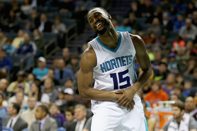 CHARLOTTE, NC - JANUARY 18:  Kemba Walker #15 of the Charlotte Hornets reacts after a play during their game against the Utah Jazz at Time Warner Cable Arena on January 18, 2016 in Charlotte, North Carolina.  NOTE TO USER: User expressly acknowledges and agrees that, by downloading and or using this photograph, User is consenting to the terms and conditions of the Getty Images License Agreement.  (Photo by Streeter Lecka/Getty Images)