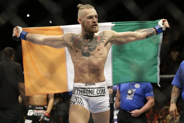 Connor McGregor celebrates after defeating Dustin Poirier in their featherweight mixed martial arts bout at UFC 178 on Saturday, Sept. 27, 2014, in Las Vegas. (AP Photo/John Locher) Connor McGregor celebrates after defeating Dustin Poirier in their featherweight mixed martial arts bout at UFC 178 on Saturday, Sept. 27, 2014, in Las Vegas. (AP Photo/John Locher)