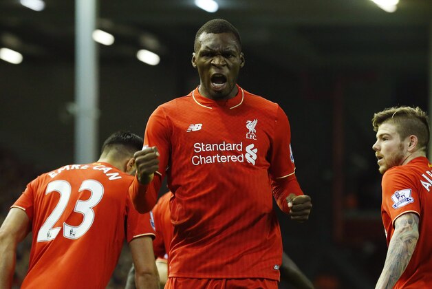 Liverpool's Zaire-born Belgian striker Christian Benteke (C) celebrates scoring the opening goal of during the English Premier League football match between Liverpool and Leicester City at the Anfield stadium in Liverpool, north-west England on December 26, 2015.  AFP PHOTO / LINDSEY PARNABY

RESTRICTED TO EDITORIAL USE. No use with unauthorized audio, video, data, fixture lists, club/league logos or 'live' services. Online in-match use limited to 75 images, no video emulation. No use in betting, games or single club/league/player publications. / AFP / LINDSEY PARNABY        (Photo credit should read LINDSEY PARNABY/AFP/Getty Images)