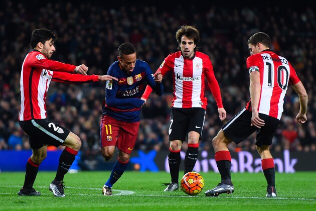 BARCELONA, SPAIN - JANUARY 17:  Neymar of FC Barcelona competes for the ball with Athletic Club de Bilbao players during the La Liga match between FC Barcelona and Athletic Club de Bilbao  at Camp Nou on January 17, 2016 in Barcelona, Spain.  (Photo by David Ramos/Getty Images)