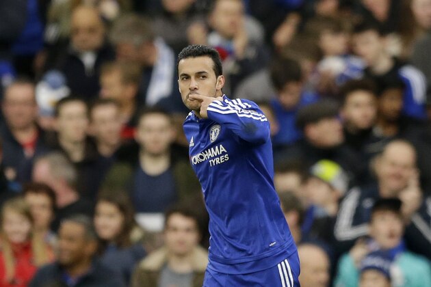 Chelsea's Pedro celebrates scoring his side's second goal during the English Premier League soccer match between Chelsea and Sunderland at Stamford Bridge stadium in London, Saturday, Dec. 19, 2015.  (AP Photo/Matt Dunham)