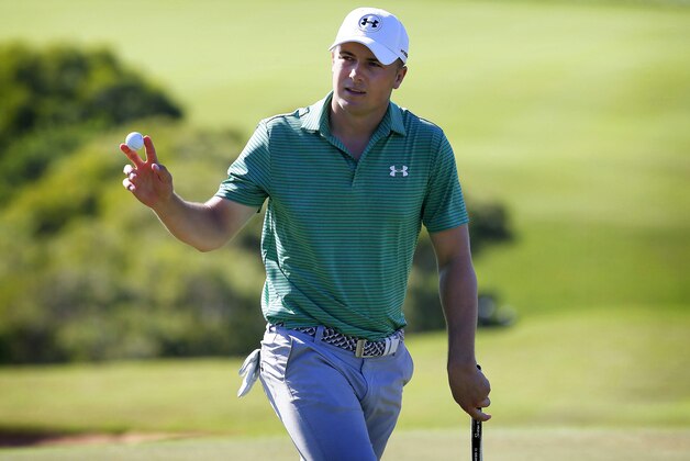 Jordan Spieth waves after his birdie putt on the ninth green during the first round of the Tournament of Champions golf event Thursday, Jan. 7, 2016, at Kapalua Plantation Course in Kapalua, Hawaii. (AP Photo/Matt York) Jordan Spieth waves after his birdie putt on the ninth green during the first round of the Tournament of Champions golf event Thursday, Jan. 7, 2016, at Kapalua Plantation Course in Kapalua, Hawaii. (AP Photo/Matt York)