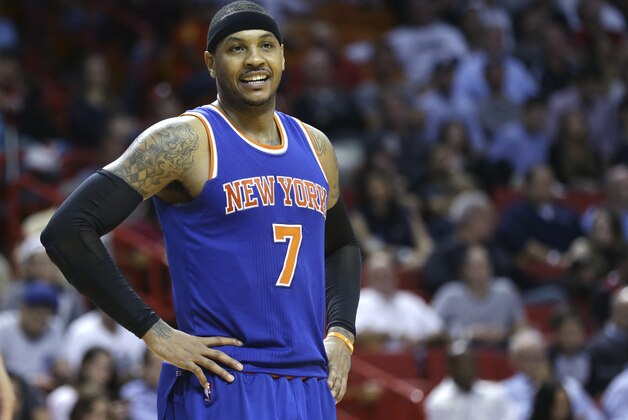 New York Knicks' Carmelo Anthony (7) smiles during the second half of an NBA basketball game against the Miami Heat, Wednesday, Jan. 6, 2016, in Miami. The Knicks defeated the Heat 98-90. (AP Photo/Lynne Sladky)
