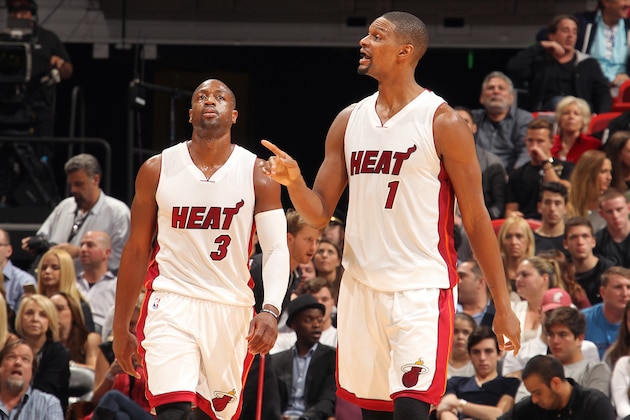 MIAMI, FL - JANUARY 4: Dwyane Wade #3 and Chris Bosh #1 of the Miami Heat looks on during the game against the Indiana Pacers on January 4, 2016 at AmericanAirlines Arena in Miami, Florida. NOTE TO USER: User expressly acknowledges and agrees that, by downloading and or using this Photograph, user is consenting to the terms and conditions of the Getty Images License Agreement. Mandatory Copyright Notice: Copyright 2016 NBAE (Photo by Issac Baldizon/NBAE via Getty Images)